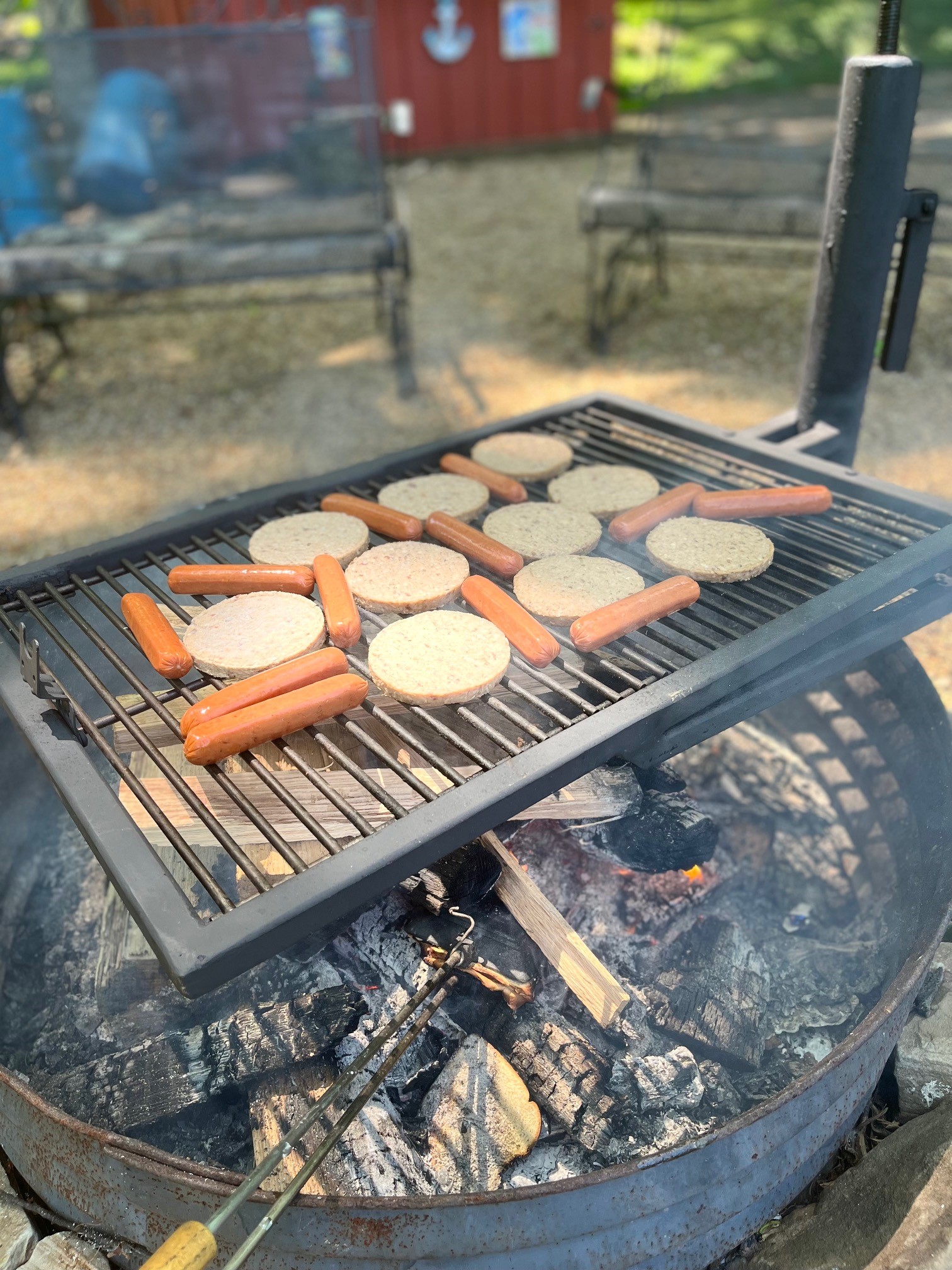 Grill hotdogs and hamburgers. Full top view.