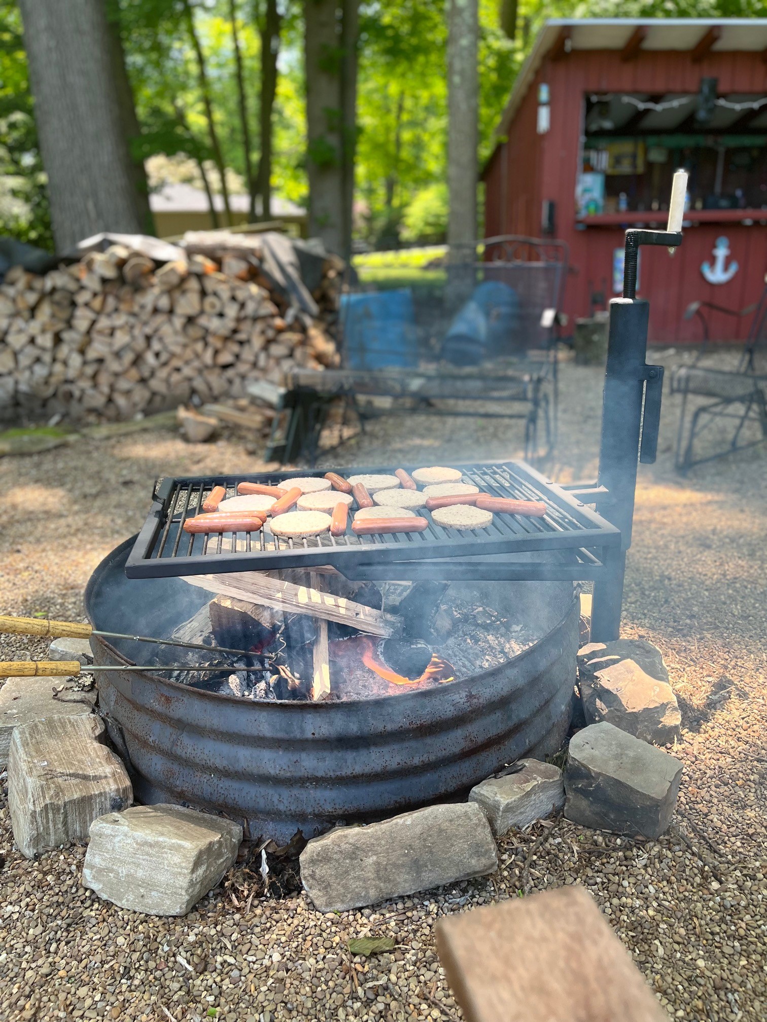 Grill hotdogs and hamburgers. Side view.